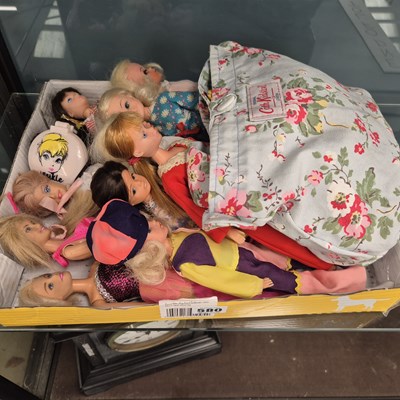 Lot 580 - A collection of Barbie type dolls together...
