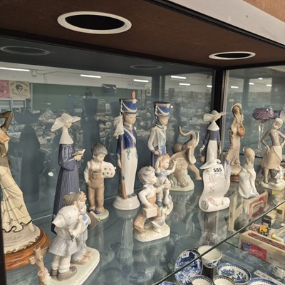 Lot 585 - A collection of Lladro and similar figures