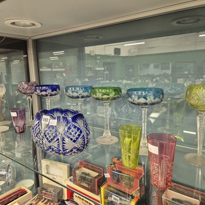 Lot 592 - Overlay glass champagnes, tumblers, and a bowl
