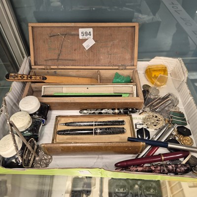 Lot 594 - A collection of fountain pens, inks and...