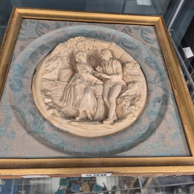 Lot 598 - A framed electroype relief of a couple in a...