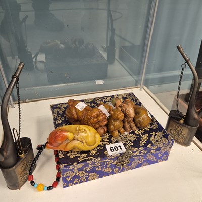 Lot 601 - Five Chinese hardstone animals together with...