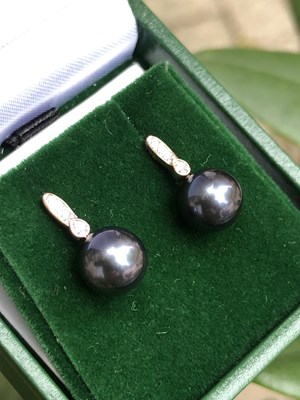 Lot 1151 - A pair of 9ct rose gold earrings with...