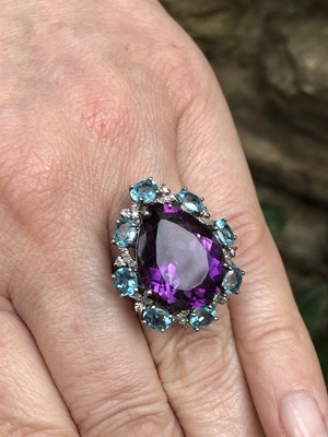 Lot 1149 - A unhallmarked silver dress ring set with a...