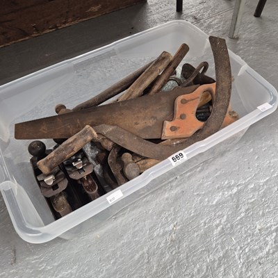Lot 669 - Wood planes, a saw, a sickle and other tools