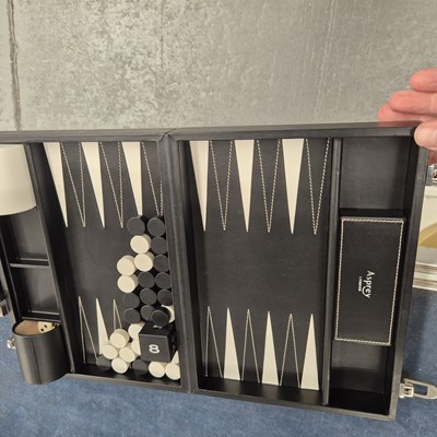 Lot 679 - An Asprey's backgammon set within a folding...