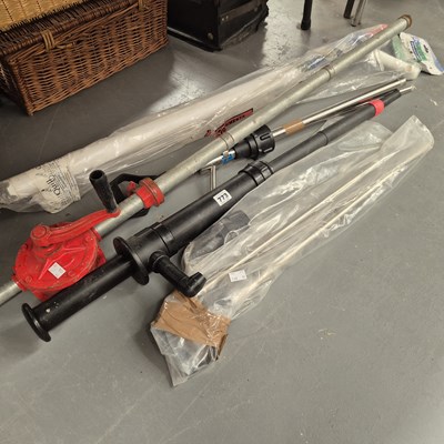 Lot 773 - A drum pump together with other pump equipment