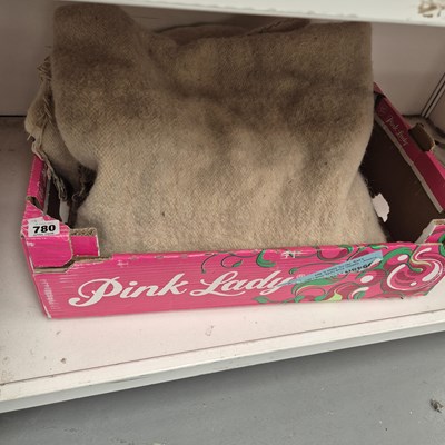 Lot 780 - A natural wool rug