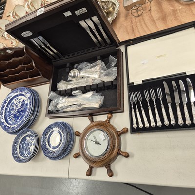 Lot 798 - Cases of steel cutlery, an aneroid barometer,...