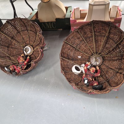 Lot 803 - A pair of clowns parachuting from basket work...