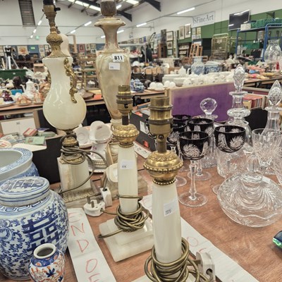 Lot 811 - A pair of alabaster column table lamps...