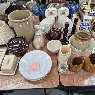 Lot 828 - Stoneware jugs, storage vessels and a hot...