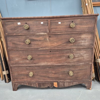 Lot 3 - A late Georgian mahogany chest of two short...