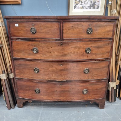 Lot 5 - A late Georgian mahogany bow-front chest of...