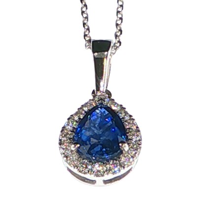 Lot 1114 - 18ct white gold pear shaped sapphire and round...