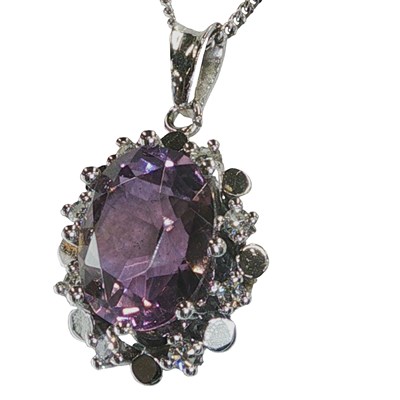 Lot 1123 - 14ct white gold, Unhallmarked pendant set with...