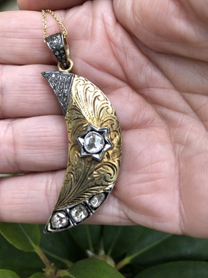 Lot 1124 - Unusual silver gilt crescent moon shaped...