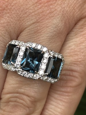 Lot 1143 - A 9ct hallmarked yellow and white gold ring...