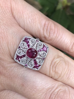 Lot 1144 - Platinum (950) Art Deco style panel ring set...