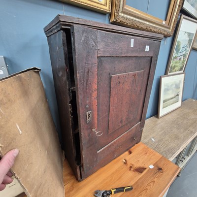 Lot 41 - An early oak panel door cabinet H 73 W 53 D 21cm