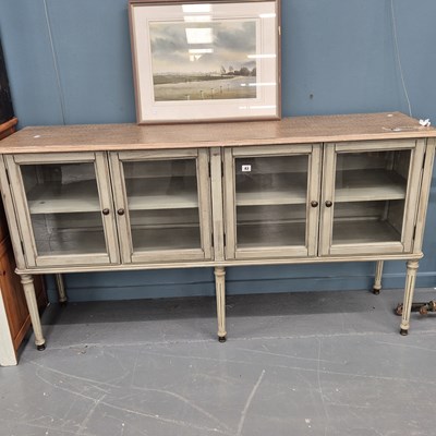 Lot 43 - An interesting glazed low sideboard H 86 W 160...