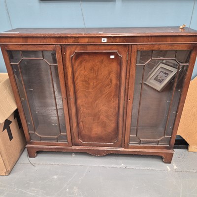 Lot 47 - A mahogany bookcase cabinet H 115 W 134 D 31