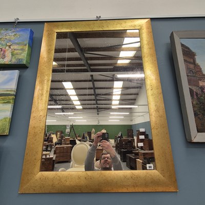 Lot 60 - A large modern gilt-framed wall mirror 108 × 78cm