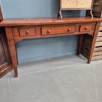 Lot 75 - A French country style hall table with three...