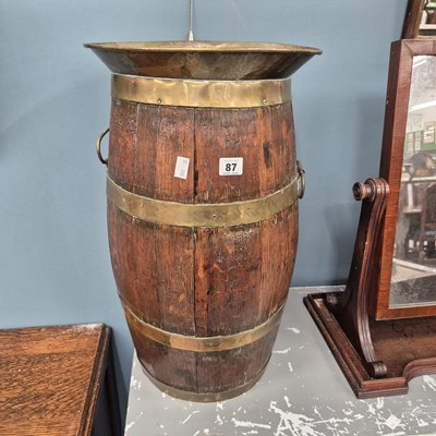 Lot 87 - A coopered brass banded barrel stick stand