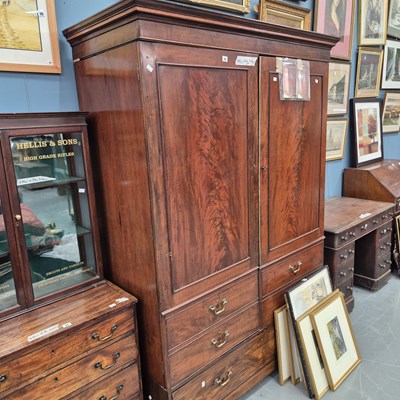 Lot 96 - A large early 19th century knock down wardrobe...