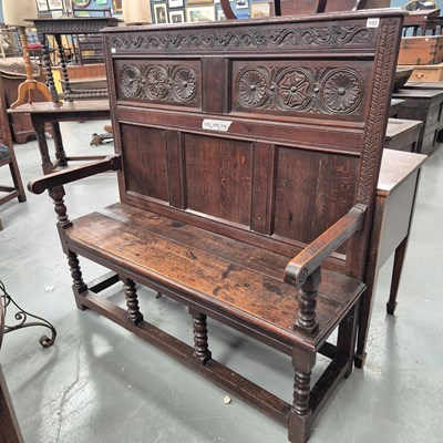 Lot 102 - A 19th century oak panel back settle H 127 W...