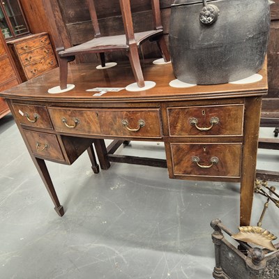 Lot 105 - A 19th century mahogany bow-front writing...