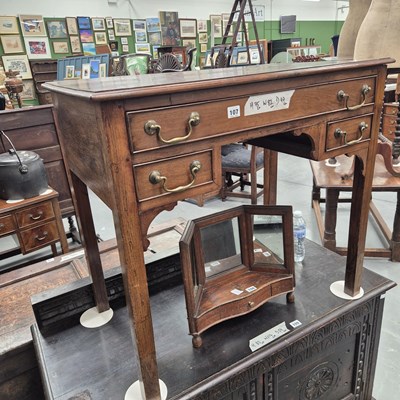 Lot 107 - A Georgian mahogany side table with three...