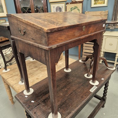 Lot 118 - A mahogany lift top clerks writing slope...