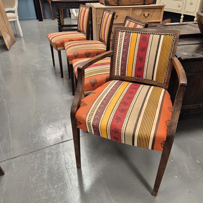 Lot 125 - A set of eight dining chairs with retro fabric...