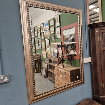 Lot 142 - A modern gilt framed wall mirror 135 × 108cm