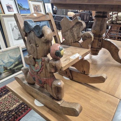 Lot 166 - A carved hardwood child's rocking chair