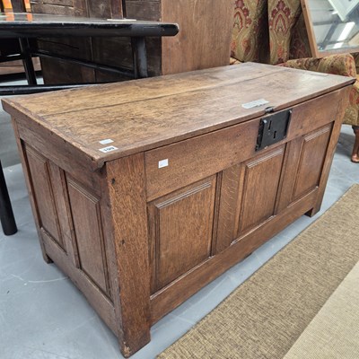 Lot 199 - An 18th century oak panel front coffer H 61 W...