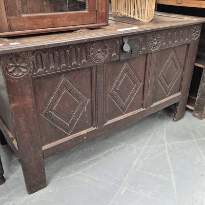 Lot 211 - An 18th century oak three-panel coffer with...