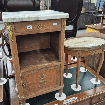 Lot 215 - A French gilt brass mounted bedside cabinet...
