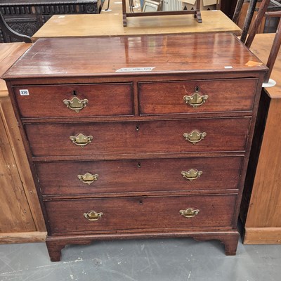 Lot 230 - A George III mahogany chest of two short and...