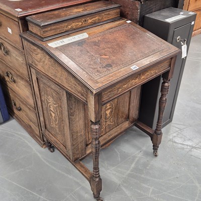 Lot 240 - An Edwardian rosewood and inlaid Davenport...