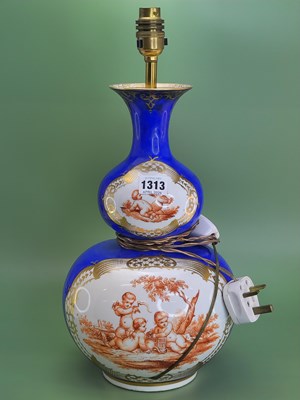 Lot 1313 - A Dresden blue ground double gourd vase as a...