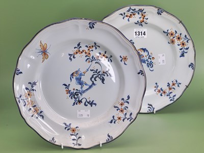 Lot 1314 - A pair of Galle faience plates gilt and...