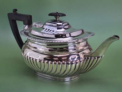 Lot 1317 - A silver tea pot by Fordham and Faulkner,...