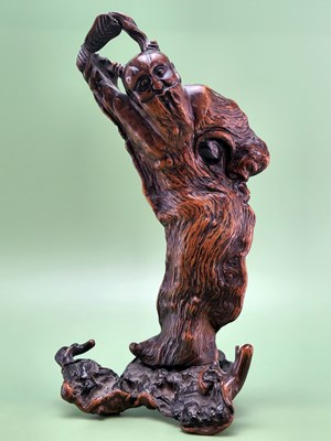 Lot 1320 - A Chinese root wood carving of a Daoist...