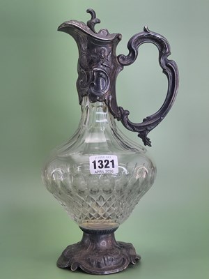 Lot 1321 - An electroplate mounted cut glass claret jug,...