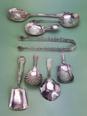 Lot 1329 - A collection of silver caddy and other spoons...