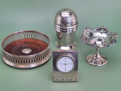 Lot 1330 - A silver caster by Harrods, London 1936, 154g,...