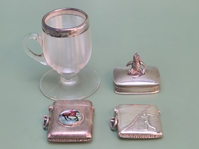 Lot 1334 - A silver golfing vesta, another with an enamel...
